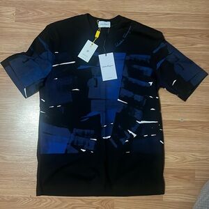 This is an Authentic Salvatore Ferragamo T-shirt Size Medium